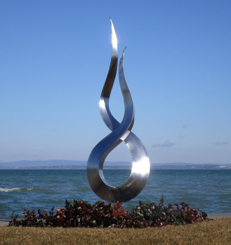 Flame garden sculpture rusty
